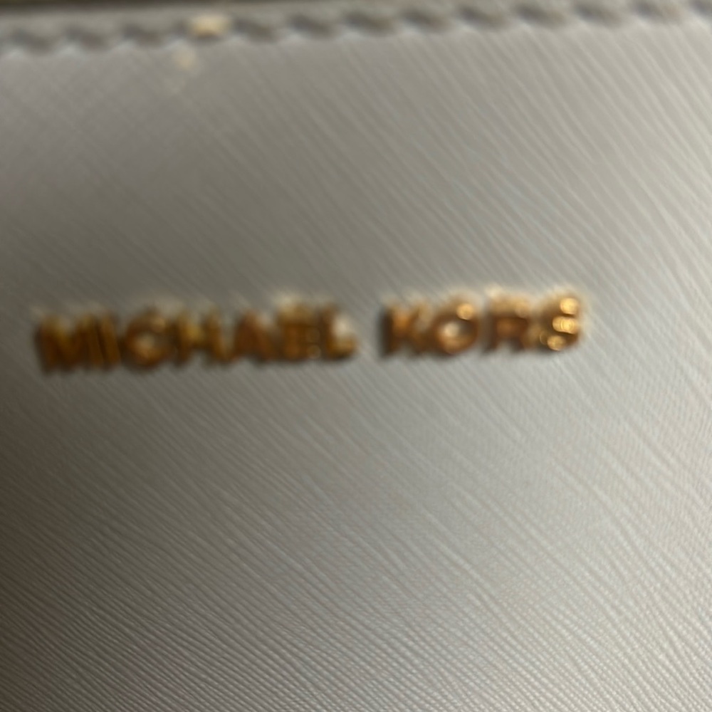 Michael Kors soft blue 12 1/2 inch across a 10 inches tall Both handle/strap